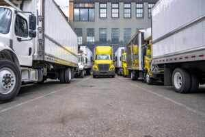 A group of commercial vehicles. An attorney can explain how you claim compensation for medical treatment after a truck accident.